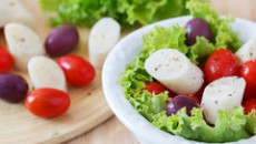 fresh-salad-heart-palm-palmito-cherry-tomatos-olives-white-plate-selective-focus-53450573