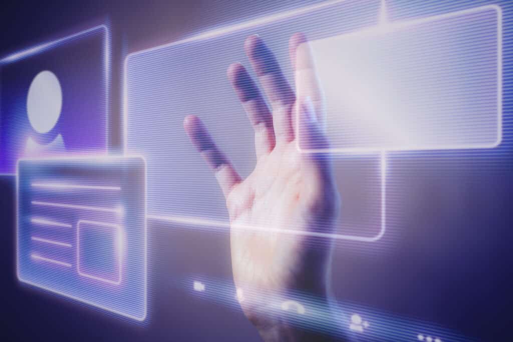 As Hard Skills mais requisitadas quando o assunto é tecnologia e inovação 2 woman touching a smart technology holographic interface