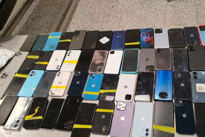 Pai e filho são presos no aeroporto de Confins com mais de 100 celulares roubados no carnaval 1 policia federal reproducao