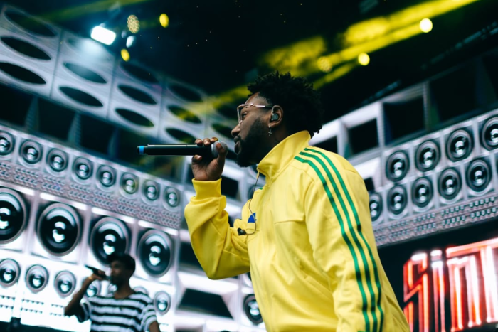 Feijão de Ogun 2025: programação musical gratuita vai de RT Mallone a rodas de samba 3 Eu ja estava aqui quando voces chegaramentao podem me chamar de Povo Originario do Rap bri