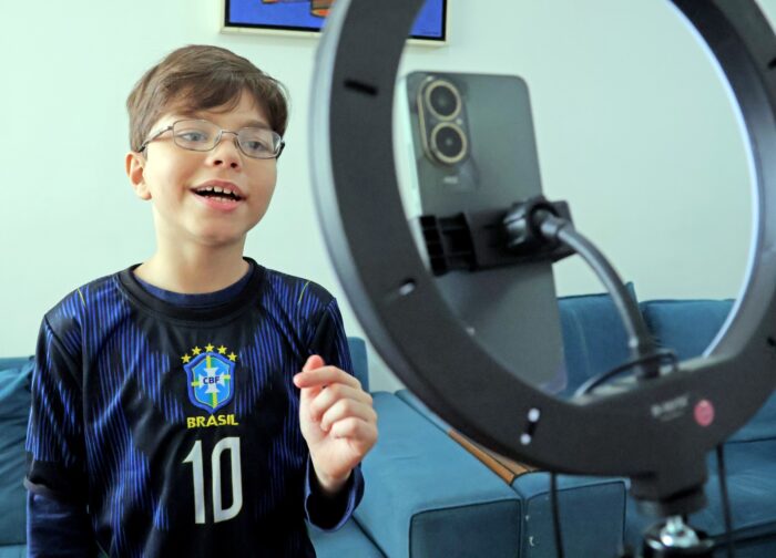 Tristeza e choros: juiz-foranos se frustam com o fim do sonho do Hexa em 2026 2 menino autista 3 foto leonardo costa